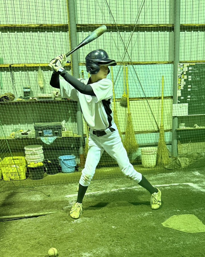 マシン打ちによる打撃練習を繰り返す余市ナイン