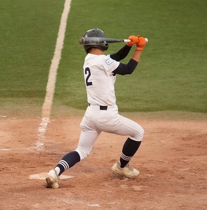 一時、勝ち越し打を放つ大門選手（札幌北）