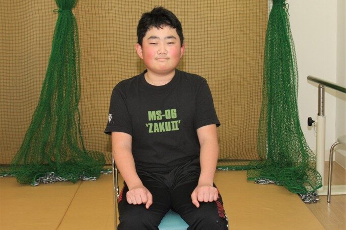 新天地へ意欲見せる北区ファイターズの高橋君 