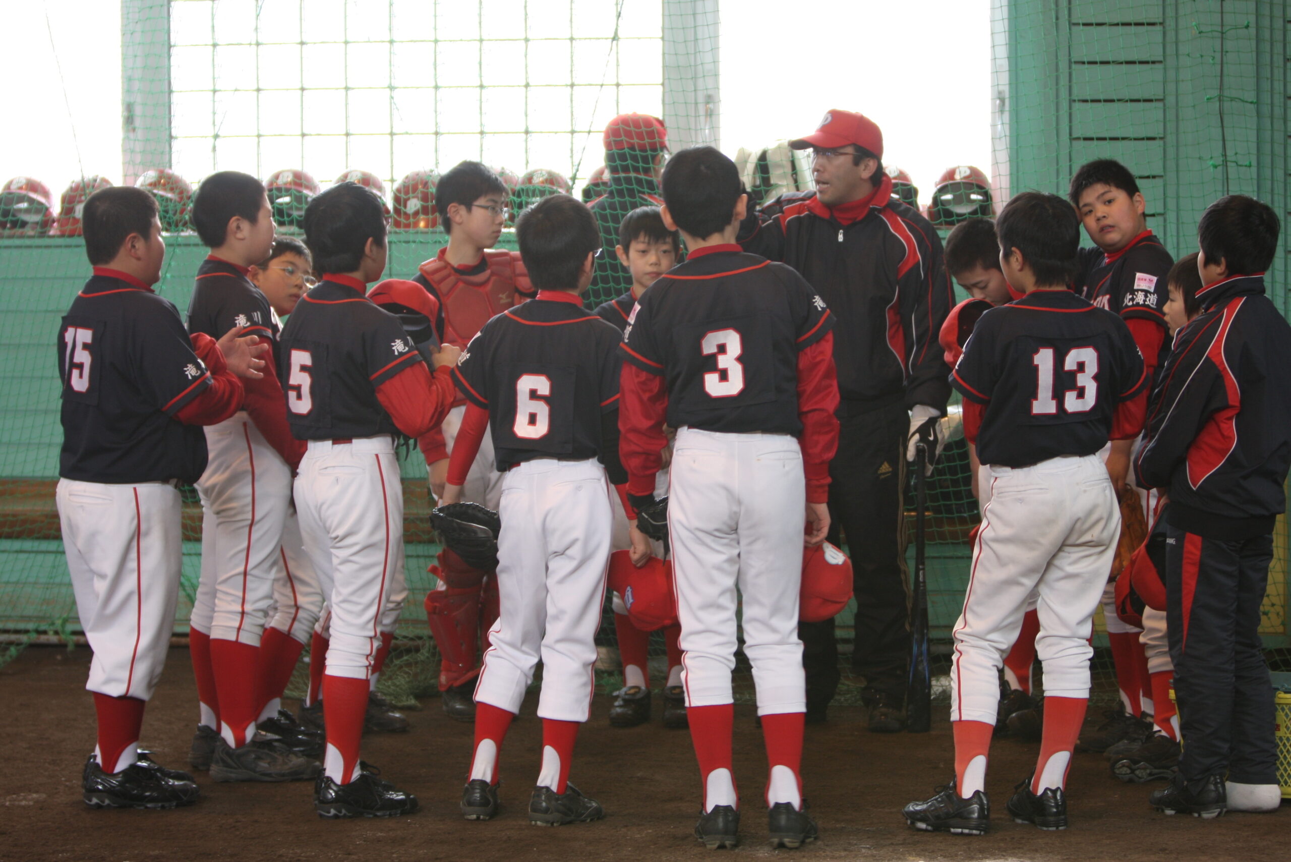 円陣で指揮を高めるジュニドラナイン!